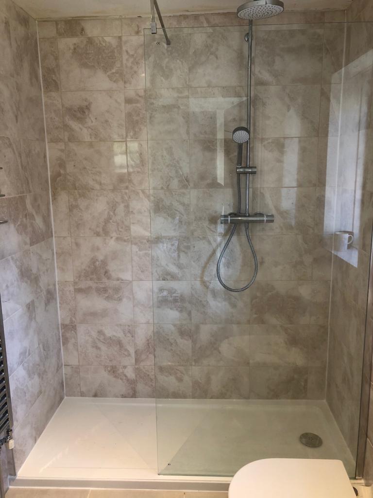 Walk in shower fitted by Norton Plumbing professional plumbers in Chapel Allerton